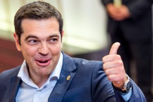 Greek Prime Minister Alexis Tsipras gestures as he leaves an EU summit in Brussels on Friday, June 26, 2015. EU leaders, in a second day of meetings, discussed migration, the Greek bailout and European defense. (AP Photo/Geert Vanden Wijngaert)